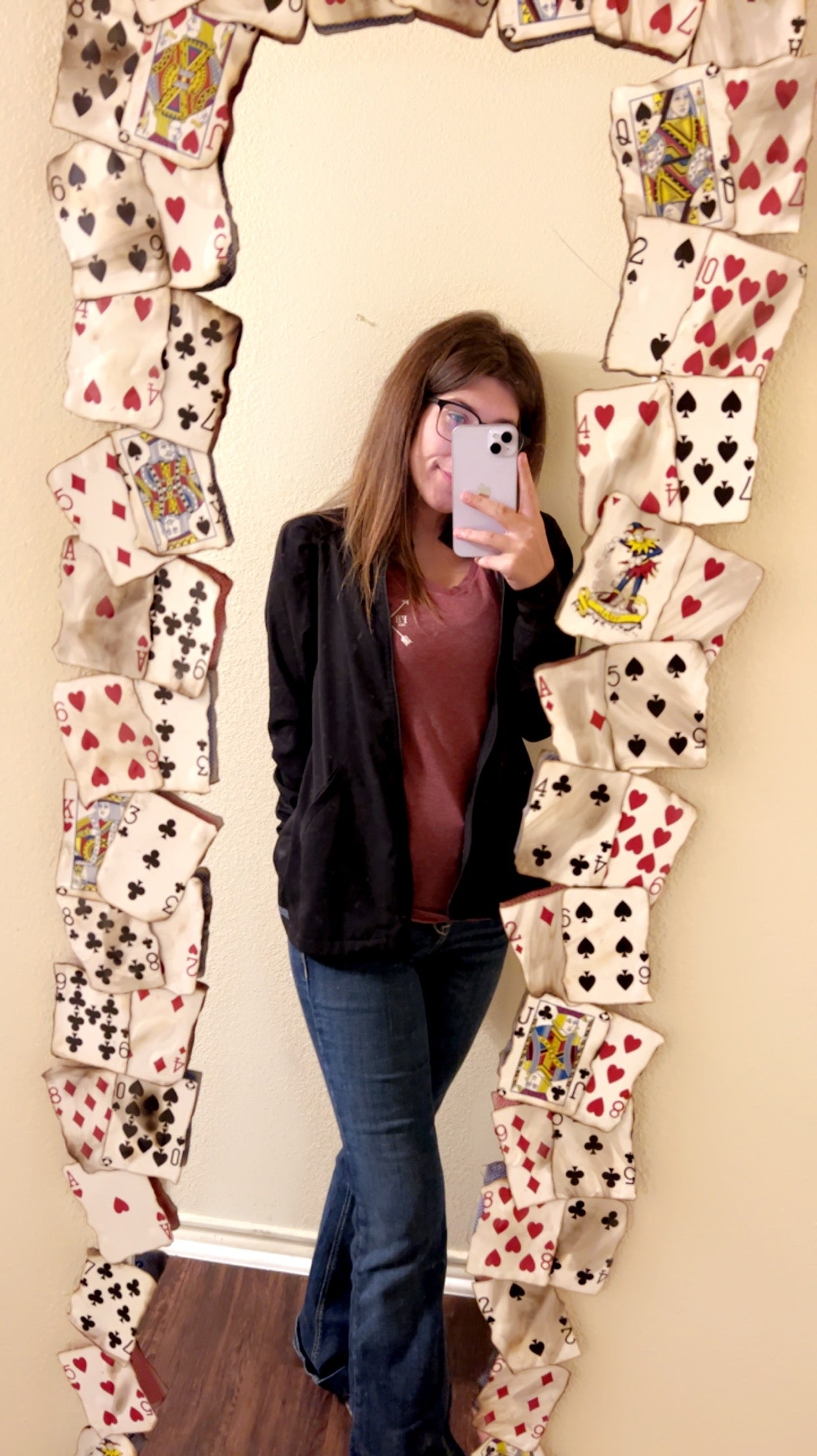 Mirror with burned playing cards